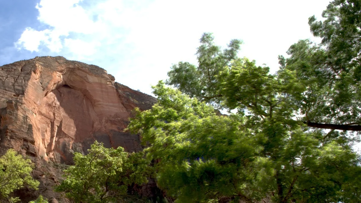 Neuro-Symbolic Learning for Predictive Process Monitoring via Two-Stage Logic Tensor Networks with Rule Pruning